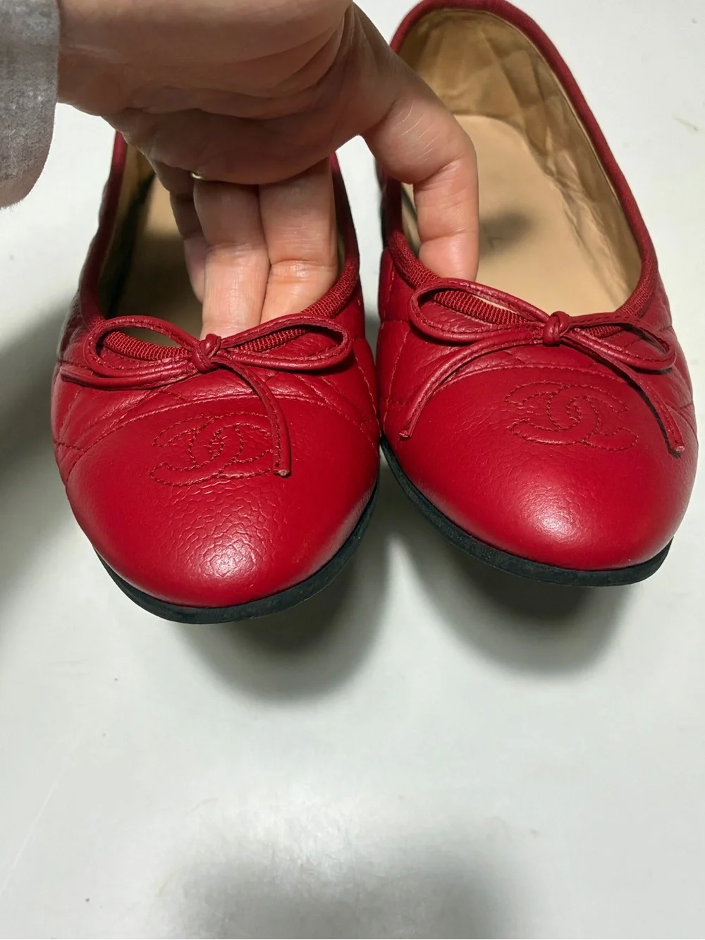 sold CHANEL Red Quilted Leather Ballet Flats with Bow and Embossed CC